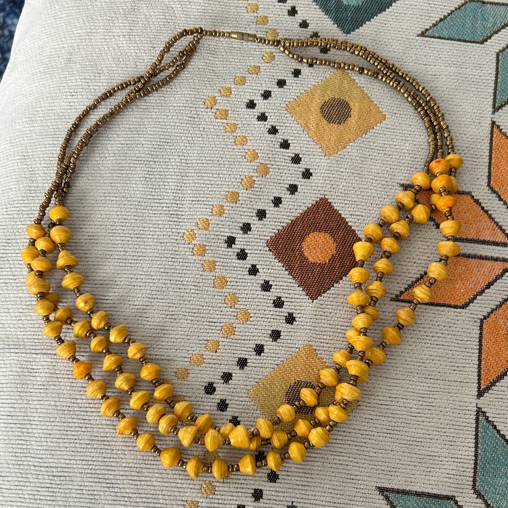 Seed bead and I believe paper beads.